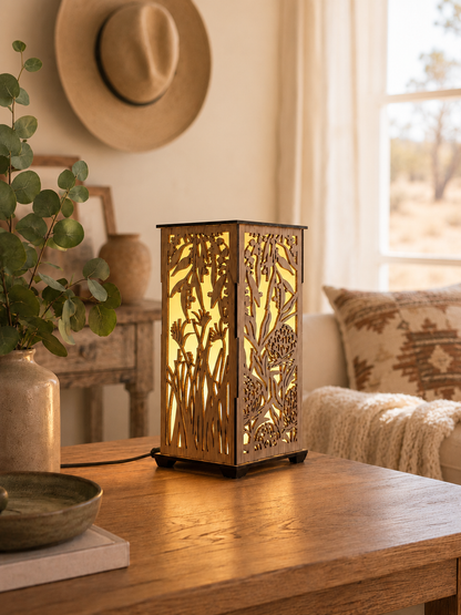 Australian hardwood lamp with Kangaroo Paw and Waratah design, lit