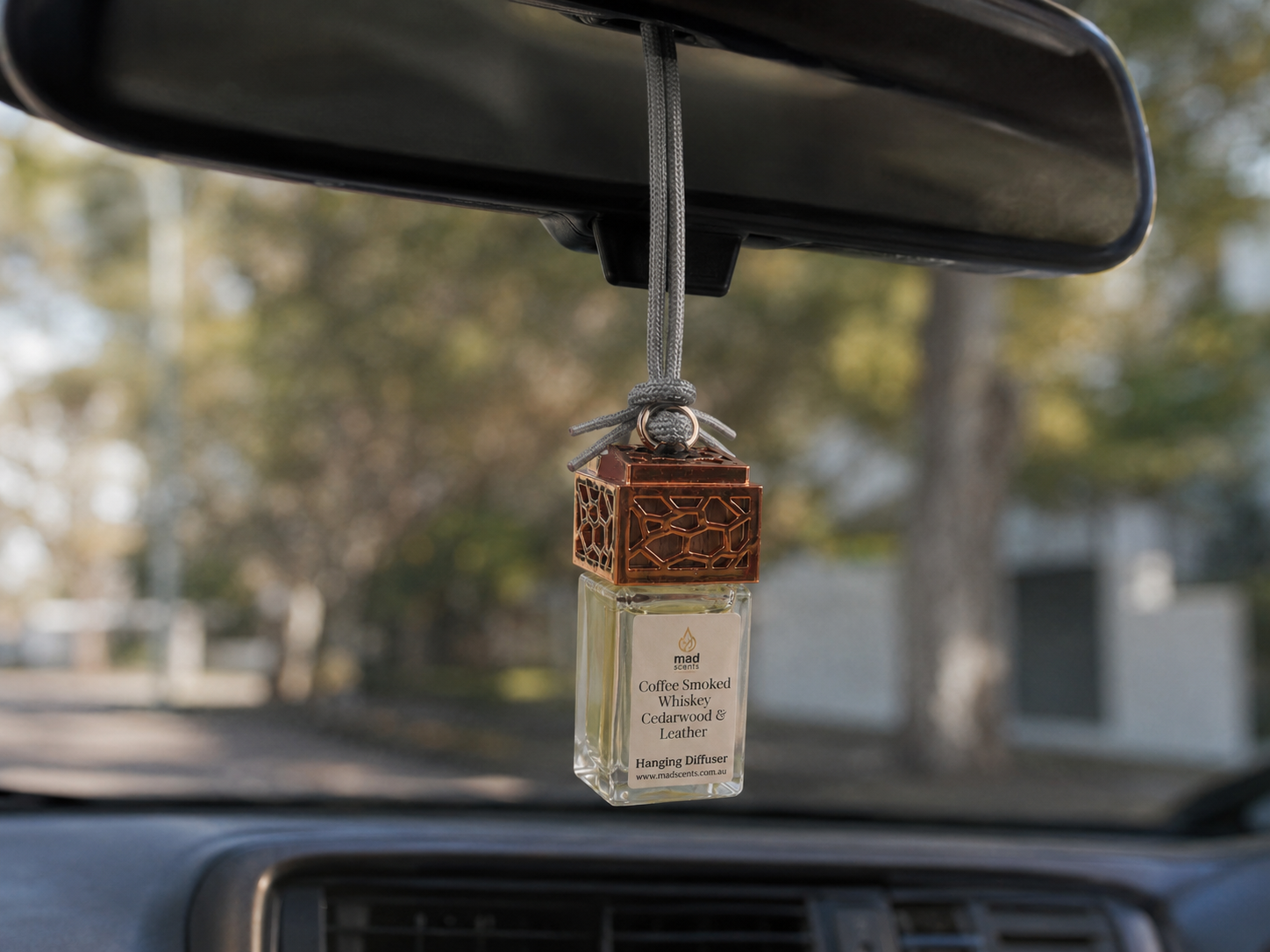 Rustic country-style car diffuser hanging from car mirror, Watermelon Lemon Sugar scent