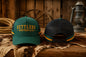 Green Settlers Western & Co snapback trucker cap, golden embroidered wordmark