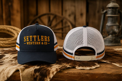 Navy blue Settlers Western & Co snapback trucker cap, golden embroidered wordmark