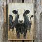 "The Herd" country art print featuring a black and white cow