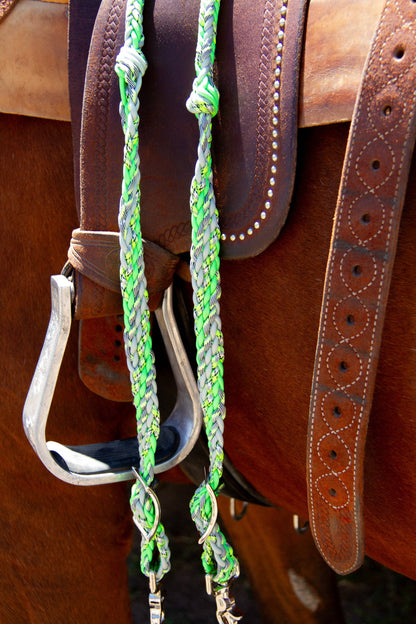Braided reins, neon green and silver nylon, coiled
