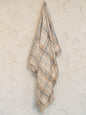 "Dusty Plains" woven throw blanket in dusty pink, hanging display, country home decor